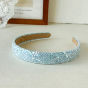 Detail of light blue sequined headband with non-slip brown velvet inner lining fabric