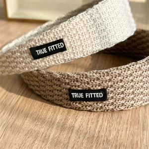 Chunky knit wide headband in beige and brown with side label for women's hair styling