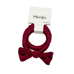 Elegant burgundy satin hair scrunchie with bow tie design on white card packaging