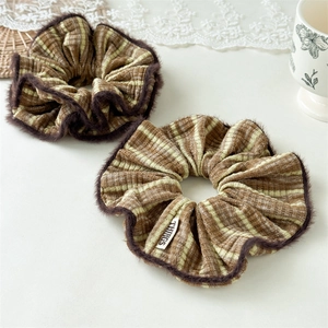 Winter striped fabric hair scrunchies with brown faux fur edges in a two-piece set