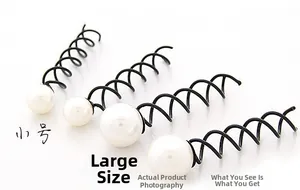 Détail des petites et grandes épingles à cheveux spirales avec perles pour chignons