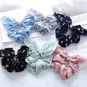 Set of six floral bow scrunchies in pink, mint, black, navy, grey, and sky blue colors
