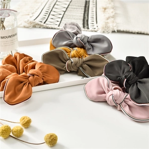 Grandi elastici per capelli a fiocco in raso con bordo a righe in vari colori eleganti