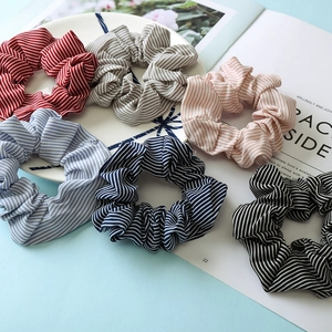 Set of six striped fabric scrunchies in various colors for stylish hair styling