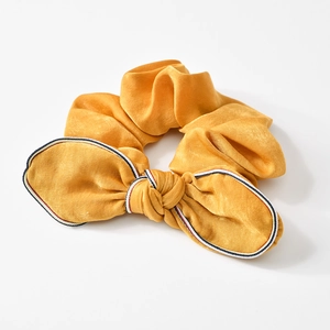 Elastico per capelli con fiocco giallo zenzero e bordo in nastro tricolore