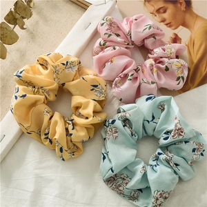 Floral print chiffon scrunchies set in soft yellow, pink and green for elegant hairstyling
