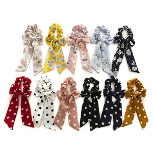 Bow hair scrunchies set featuring floral and polka dot patterns in various colors