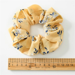 Floral chiffon scrunchie in light yellow with white flowers, 11cm diameter measurement