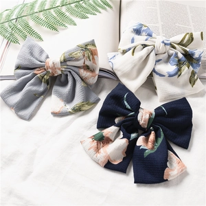 Three-piece floral chiffon bow hair clips in grey, beige and navy blue elegant colors