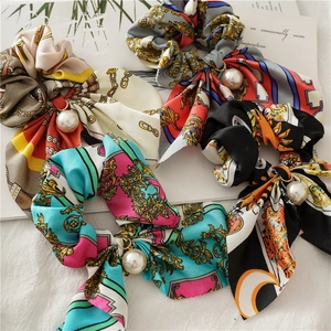 Elegant scrunchie set with long bunny ear ribbons and pearl charms in vintage patterns