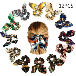 Set of 12 silk satin scrunchies with long ribbons and pearl pendants in various patterns
