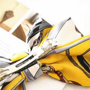 Three-layer satin bow hair clip with yellow chain print and handmade spring buckle