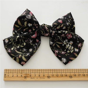 Large double-layer chiffon floral bow hair clip in black with pink and white prints