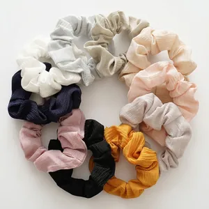 Set aus 9 bunten Haargummis mit Waffelstruktur in verschiedenen Farben für Damen