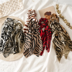 Assorted leopard and snake print hair scrunchies with long ribbons in French style