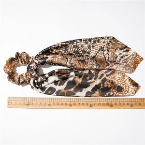 Leopard and snake print hair scrunchie with long ribbons for vintage women hairstyles