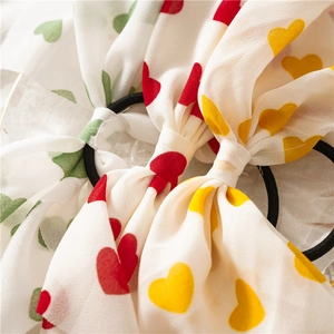 Lot de 3 chouchous à nœud avec motif cœur en mousseline rouge vert et jaune
