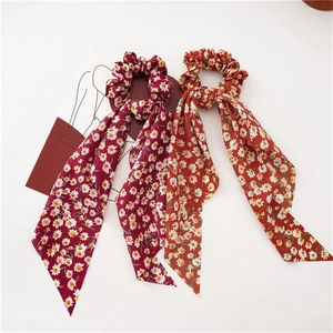 Floral chiffon scrunchie set with long streamers and daisy print in burgundy and orange