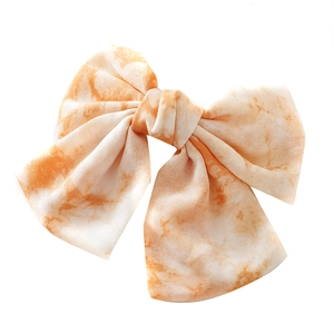 Barrette à cheveux avec grand nœud en tissu tie-dye orange et blanc pour femmes