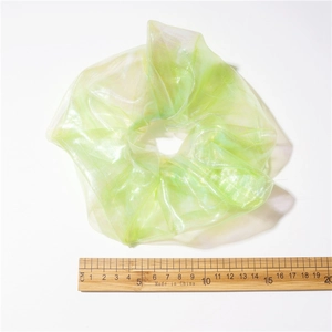Green iridescent organza scrunchie with 18cm oversized diameter and pearlescent finish