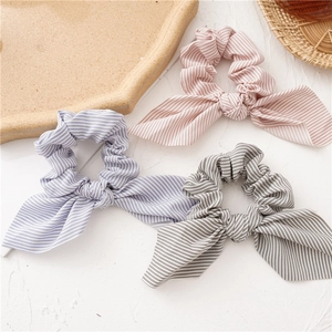 Striped bunny ear scrunchies in pink, blue and grey cotton fabric for women