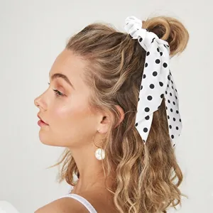 Floral polka dot knot scrunchie hair tie with long ribbons for women side view