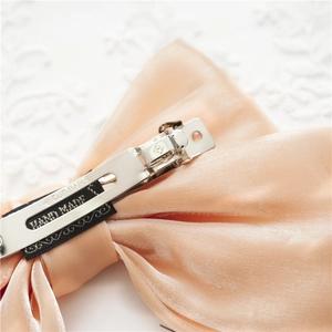 Barrette à cheveux élégante en satin abricot avec double nœud et ruban fait main
