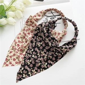 Floral chiffon hair scrunchies with long ribbons in beige and black rose patterns