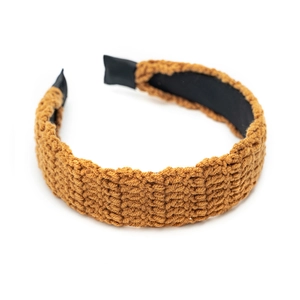 Caramel brown handmade crochet headband with retro wave texture and inner black lining