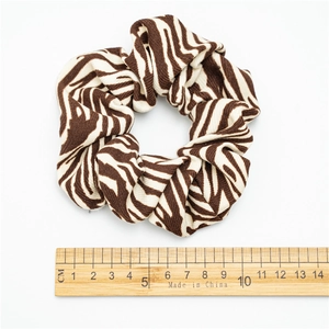 Fashionable zebra stripe hair scrunchie in brown and white knit fabric, 11cm diameter size