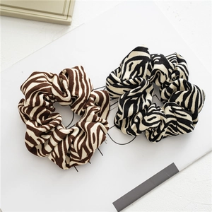 2-piece set of zebra pattern knit scrunchies in coffee and black for elegant styling