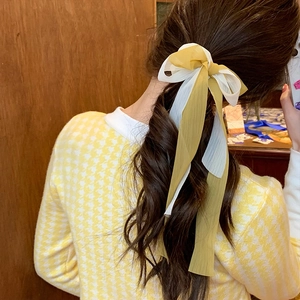 Chouchou rétro jaune avec nœud et longs rubans translucides pour coiffure femme