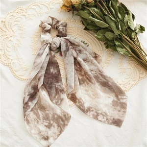 Tie-dye long ribbon hair scrunchie in dark brown and creamy white marble pattern