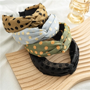 Set of four French retro polka dot twist knot headbands in assorted pastel colors