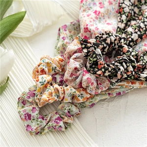 Floral chiffon scrunchie set with vibrant flower patterns and elastic hair ties