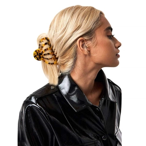 Large tortoiseshell acetate hair claw clip for women shown on a model's ponytail