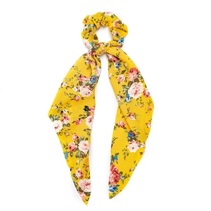 Chouchou fleuri jaune avec ruban long et motif rose pour coiffure féminine