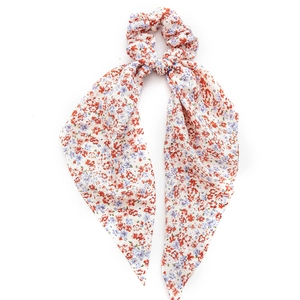 Chouchou à fleurs avec longs rubans en mousseline crème et motifs floraux rouges et bleus