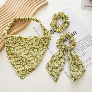 Detailed set of floral green hair accessories including bandana, scrunchies and bow ties