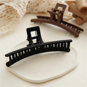 Elegant large matte shark hair clips in black and dark brown for women's hairstyling
