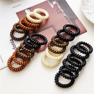 Minimalist matte spiral hair ties in earth tones with high elasticity for women
