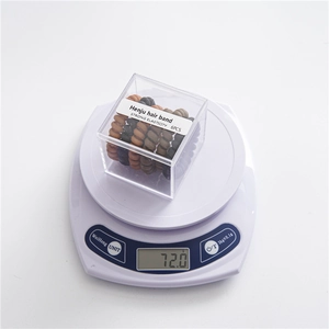 Detailed view of 6-piece earth tone spiral hair ties in a clear box weighing 72 grams