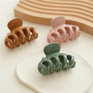 Three-piece set of small glossy resin shark hair claws in brown, pink and dark green