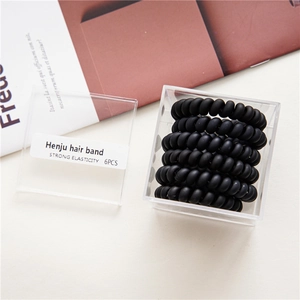 Set of 6 black matte spiral hair ties in transparent storage box with high elasticity