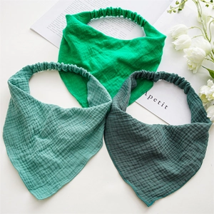 Three-piece set of breathable cotton gauze triangle headbands in shades of green