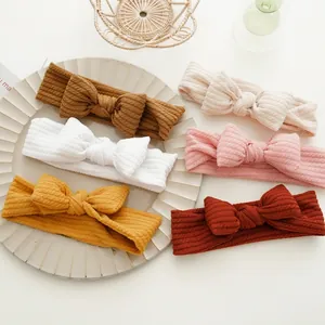 Lot de six bandeaux extensibles en coton côtelé pour bébé avec nœuds papillon