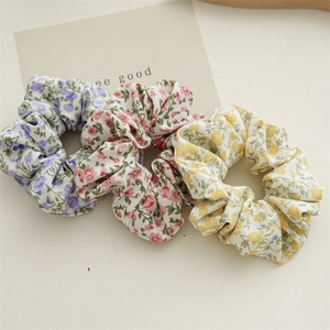 Set di tre elastici per capelli in chiffon a fiori con motivi primaverili viola e rosa