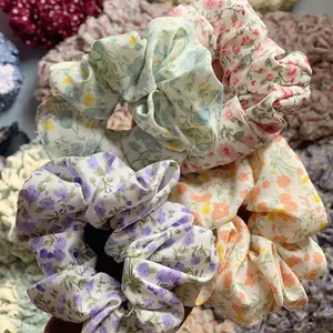 Elastici per capelli in chiffon a fiori blu e gialli per acconciature eleganti