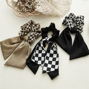 Three elegant checkered bow hair scrunchies with long ribbons in French vintage style