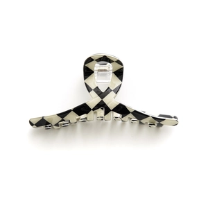 Chic black and white checkerboard hair claw clip with glossy finish and metal spring